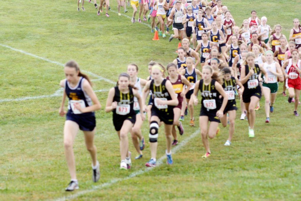 Start of Hansons Invitational going up hill. 
From front to back:
Katelyn Carney, Julia Rustmann.