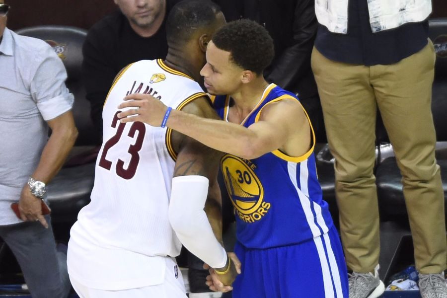 Lebron James (left) and Steph Curry (right) shake hands after last years game six. 