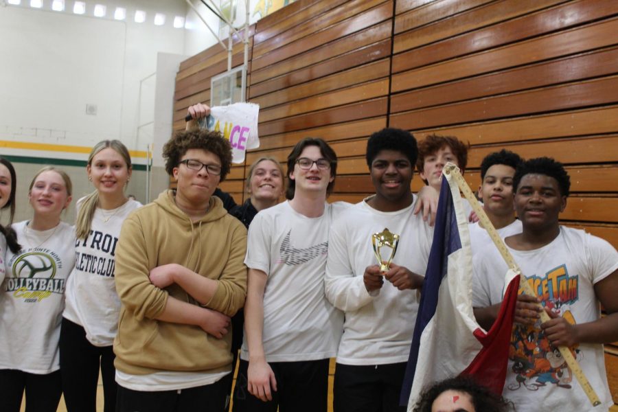 SWEET VICTORY | The French team held up their flag and trophy after their victory over the German class. French teacher Amy Olenzek had very positive things to say about the teams victory. “They did really well and it was a fierce game,” Olenzek said.