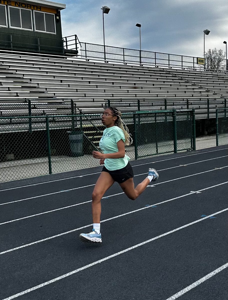NEW COACHES, NEW NORMAL | Upon the introduction of new sprint coach Erinne Lubienski, track members took on a change within their typical routine, according to junior Mimi Trupiano. “It definitely changed because people had to get used to different rules and different ways that we did practice and workouts.”
